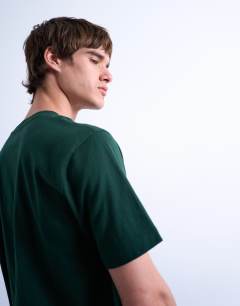Model wearing Regular fit t-shirt in pine green