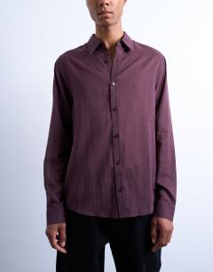 Model wearing Regular fit texture sheer shirt in burgundy