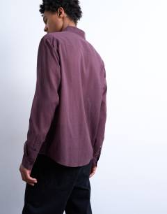Model wearing Regular fit texture sheer shirt in burgundy
