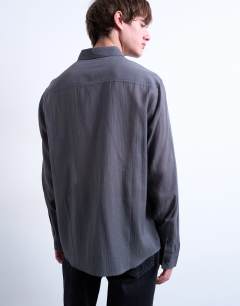 Model wearing Regular fit texture sheer shirt in charcoal