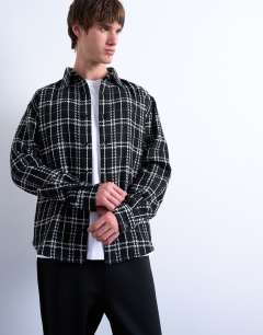 Model wearing Regular fit textured check overshirt in black