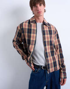Model wearing Regular fit textured check overshirt with zip in navy