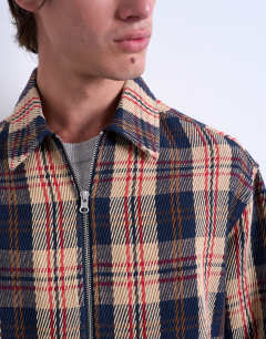 Model wearing Regular fit textured check overshirt with zip in navy