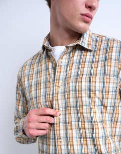 Model wearing Regular fit textured check shirt in stone