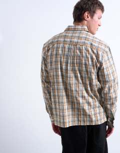 Model wearing Regular fit textured check shirt in stone