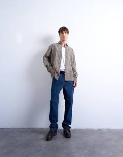 Model wearing Regular fit textured gingham check shirt in brown