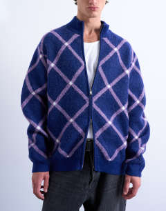 Model wearing Regular fit zip through funnel neck argyle knitted cardigan in purple