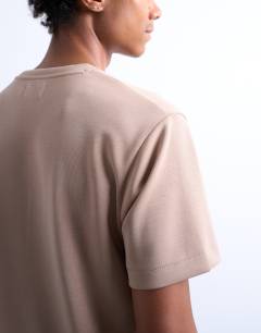 Model wearing Regular mercerised t-shirt in stone