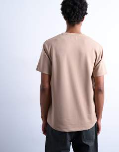 Model wearing Regular mercerised t-shirt in stone