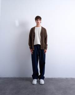 Model wearing Regular v neck cardigan in brown