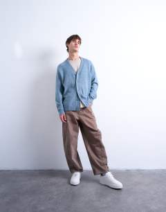Model wearing Regular v neck cardigan in mid blue