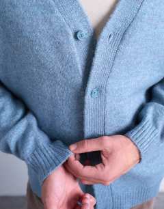 Model wearing Regular v neck cardigan in mid blue