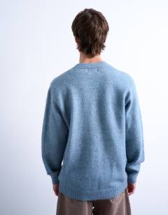 Model wearing Regular v neck cardigan in mid blue