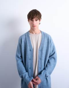 Model wearing Regular v neck cardigan in mid blue