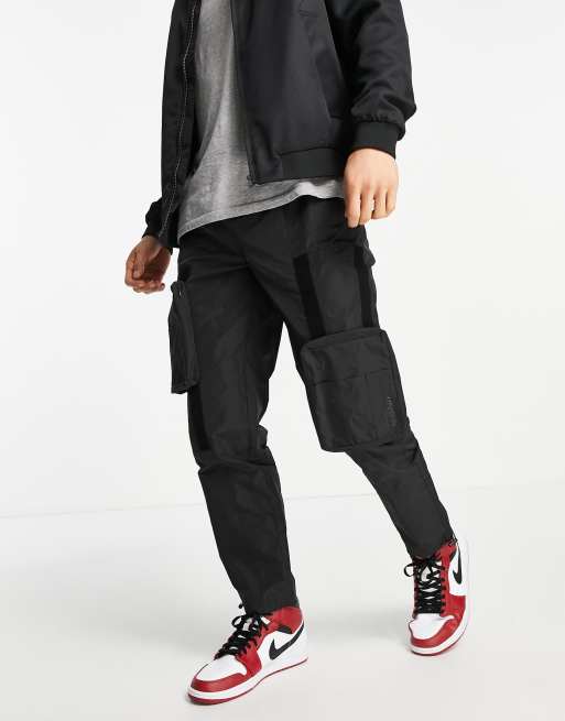 Topman relaxed cargo trousers with detachable pockets in black ASOS