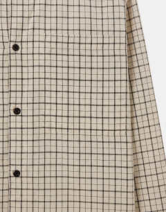 Model wearing Relaxed crop fit check shirt in ecru