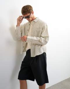 Model wearing Relaxed crop fit check shirt in ecru