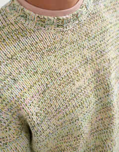 Model wearing Relaxed crop fit twist knit jumper in pastel