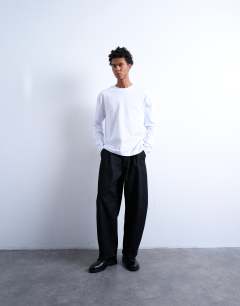 Model wearing Relaxed cropped fit long sleeve t-shirt in white