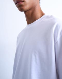 Model wearing Relaxed cropped fit long sleeve t-shirt in white