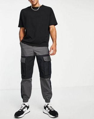 Topman relaxed cut and sew panelled cargo trousers in charcoal