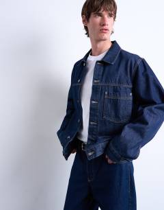 Model wearing Relaxed denim jacket in raw