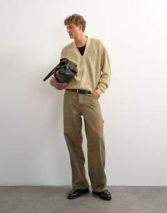 Model wearing Relaxed fit acid wash knitted zip through cardigan in beige