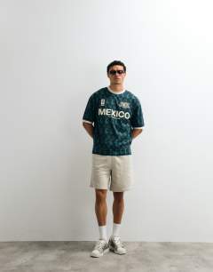 Relaxed fit bermuda jogger short in washed stone