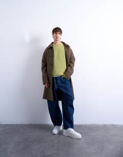 Model wearing Relaxed fit boucle jumper in green