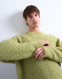 Model wearing Relaxed fit boucle jumper in green
