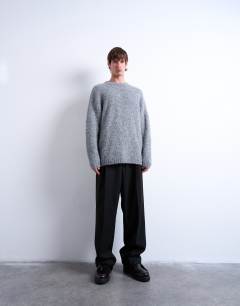 Model wearing Relaxed fit boucle jumper in light grey