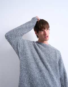 Model wearing Relaxed fit boucle jumper in light grey