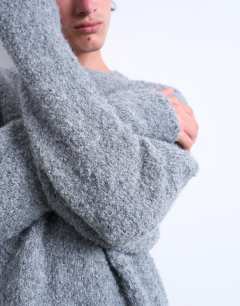 Model wearing Relaxed fit boucle jumper in light grey