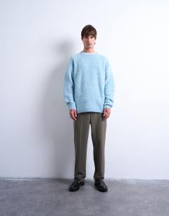 Model wearing Relaxed fit boucle jumper in mid blue