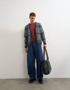 Model wearing Relaxed fit brushed striped knitted cardigan in grey