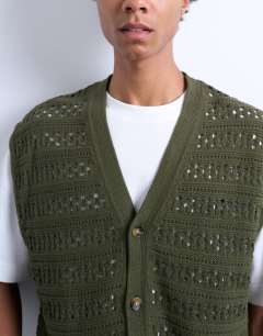 Model wearing Relaxed fit button through knitted tank in khaki