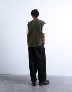 Model wearing Relaxed fit button through knitted tank in khaki
