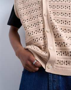 Model wearing Relaxed fit button through knitted tank in stone