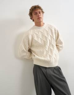 Relaxed fit cable knitted jumper in ecru
