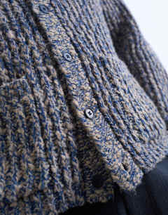 Model wearing Relaxed fit chunky twist cardigan in navy