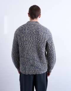 Model wearing Relaxed fit chunky twist cardigan in navy