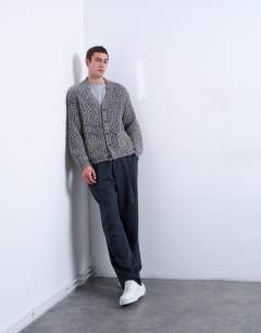 Model wearing Relaxed fit chunky twist cardigan in navy