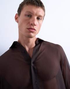 Model wearing Relaxed fit crinkle texture sheer shirt in brown