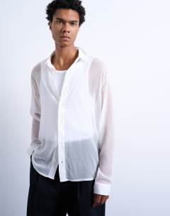 Model wearing Relaxed fit crinkle texture sheer shirt in white