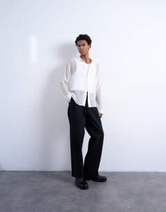 Model wearing Relaxed fit crinkle texture sheer shirt in white