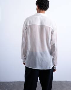 Model wearing Relaxed fit crinkle texture sheer shirt in white
