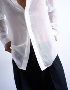 Model wearing Relaxed fit crinkle texture sheer shirt in white