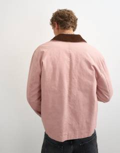 Model wearing Relaxed fit crop barn jacket with cord collar in dusty pink