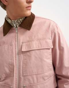 Model wearing Relaxed fit crop barn jacket with cord collar in dusty pink