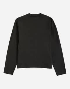 Model wearing Relaxed fit crop long sleeve t-shirt in black